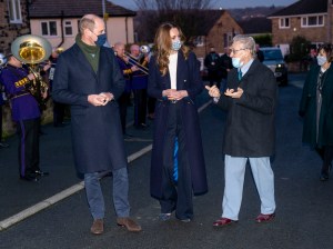 Duke and Duchess of Cambridge royal train tour. The Duke and Duchess of Cambridge meet Len Gardner, during a visit to Batley, West Yorkshire, on the second day of a three-day tour across the country. Picture date: Monday December 7, 2020. During the tour William and Kate will visit communities, outstanding individuals and key workers to thank them for their efforts during the coronavirus pandemic. See PA story ROYAL Train. Photo credit should read: Arthur Edwards/The Sun/PA Wire URN:56993425 (Press Association via AP Images)