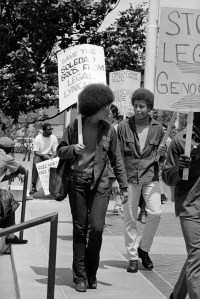 Activist Angela Davis, left, and Jonathan Jackson are seen marching in a demonstration in Los Angeles on June 19, 1970, for the prisoners accused of killing a guard at Soledad Prison in January.