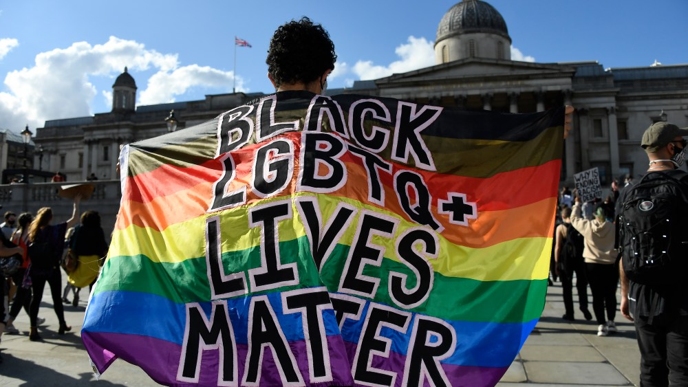 People participate in a rally at Trafalgar Square in central London, organized by Black Lives Matter, in the wake of the killing of George Floyd by police officers in Minneapolis.
