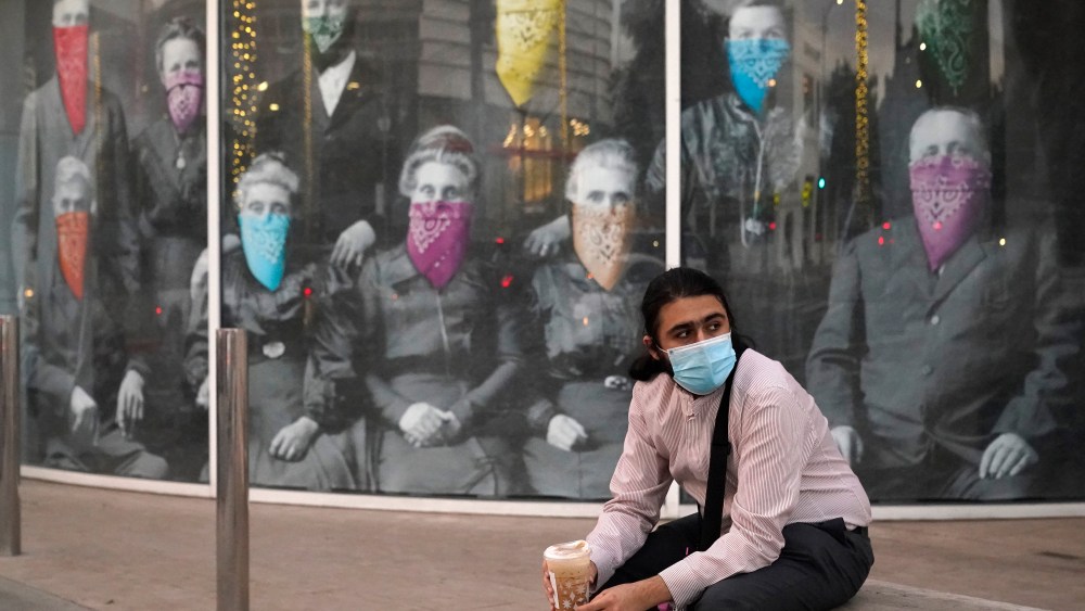 A mask window mural in Beverly Hills