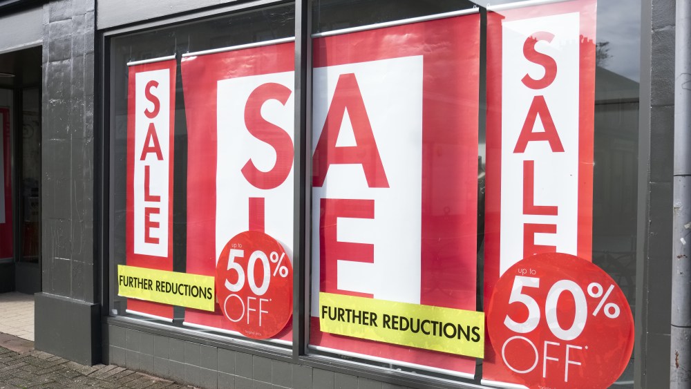 store with sale signs