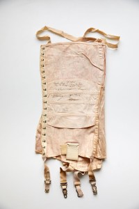 Warner’s corselette, signed on Aug. 1, 1924, by company president John Field and others.