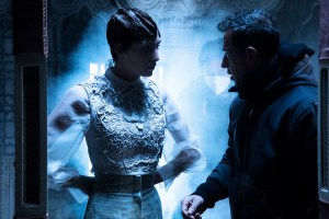 Director Matteo Garrone talks to a model on the set of his short film for Dior.