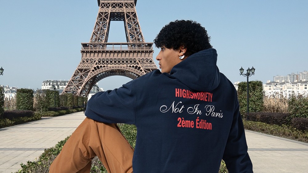 A hoodie from Highsnobiety's "Not in Paris II" merchandise collection.