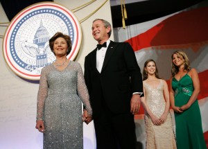President George W. Bush and first lady Laura Bush, with daughters Barbara, and Jenna at far right, attend The Constitution Ball at the Washington Hilton, Janary 20, 2005.