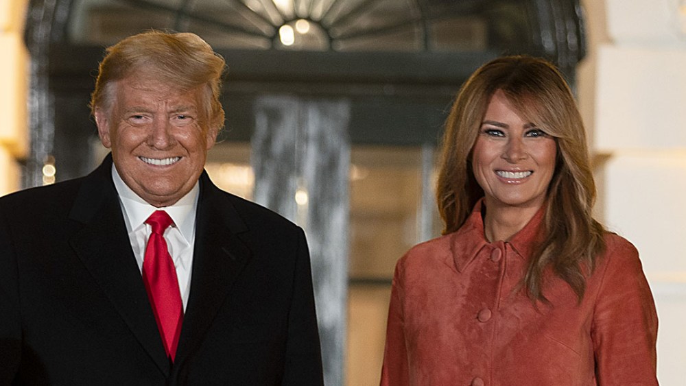 melania trump fashion and style, President Donald Trump and First Lady Melania Trump great guests on the south lawn of the White House on October 25, 2020 in Washington, DC. To ensure the health and safety of guests and staff during the Halloween festivities, extra measures such as facemasks, social distancing, and hand-sanitizer were put in place. (Photo by Tasos Katopodis/Getty Images)