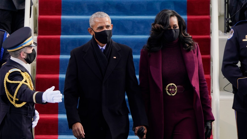 Former President Barack Obama and his wife Michelle arrive for the 59th Presidential Inauguration at the U.S. Capitol for President-elect Joe Biden in Washington, Wednesday, Jan. 20, 2021. (AP Photo/Patrick Semansky, Pool)