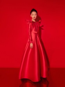 Actress Zhou Dongyu wears Alexis Mabille haute couture and Boucheron Plume de Paon earrings and ring for the Spring Festival Gala 2021.