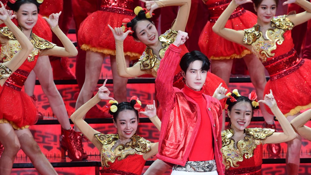 Actor Wang Yibo wears a total look from Chanel's spring 2021 collection for the Spring Festival Gala 2021.