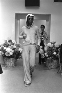 Model Bethann Hardison in a french terry sweatsuit and sunglasses designed by  Stephen Burrows for Resort 1973.