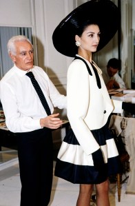 Designer Philippe Venet poses with a model in an ensemble from his Spring 1992 Couture Collection advance.