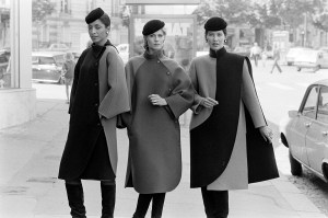 Models pose in coats from Philippe Venet's Fall 1982 Couture Collection Advance.