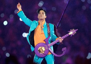 FILE - In this Feb. 4, 2007, file photo, Prince performs during the halftime show at the Super Bowl XLI football game in Miami. "Prince: The Beautiful Ones," the memoir Prince started but didn’t finish before his 2016 death, will be released  on Tuesday, Oct. 29, 2019. (AP Photo/Chris O'Meara, File)