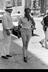 Director Peter Yates (L) and Christopher Plummer prepare for filming during production of "Eyewitness" in New York City on June 24, 1980.