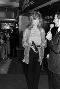 Army Archerd (R) interviews Jane Fonda (C) during the local premiere of "The China Syndrome" in Los Angeles, California, on March 8, 1979.