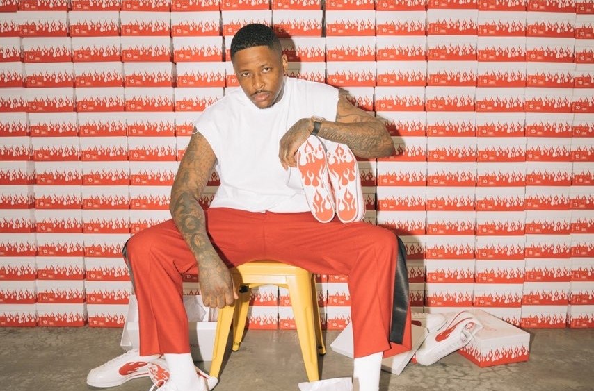 YG in his 4Hunnid Block Runner sneakers.