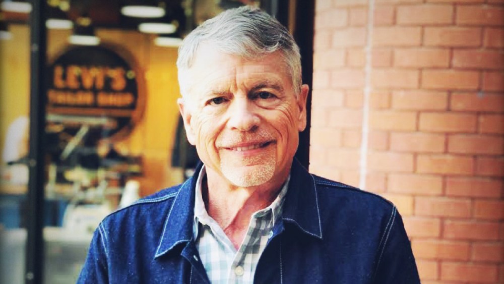 Robert Eckert wearing levi's denim jacket