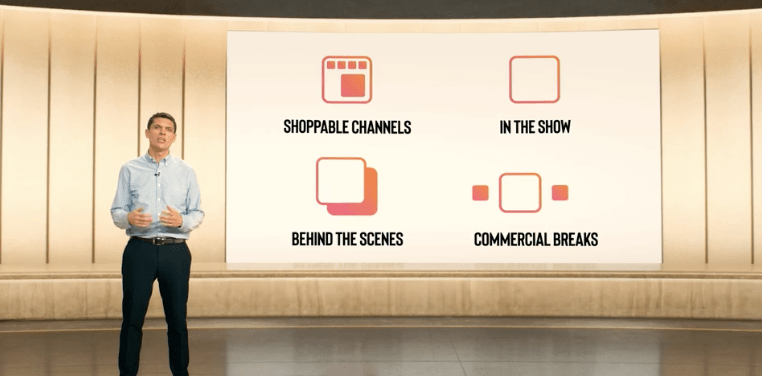 Evan Moore of NBCUniversal talking TV shopping and commerce during a live presentation.