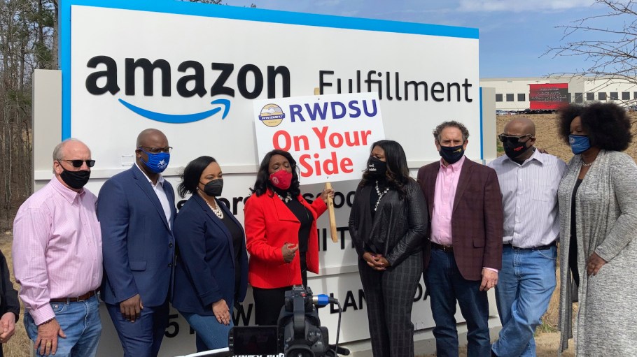 Democratic members of Congress join representatives of the Retail, Wholesale and Department Store Union gather outside an Amazon fulfillment center in Bessemer, Ala., on March 5, 2021, to advocate for the ongoing unionization vote at the sprawling campus. The elected officials pictured include, starting second from left, Rep. Jamaal Bowman of New York, Nikema Williams of Georgia, Terri Sewell of Alabama, Cori Bush of Missouri and Andy Levin of Michigan.