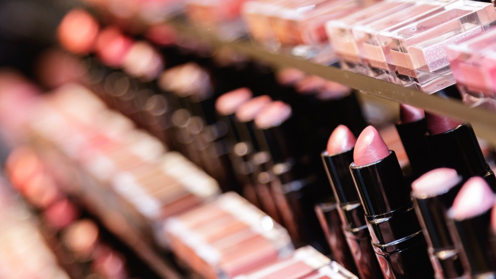Testers of different lipsticks in the cosmetic store
