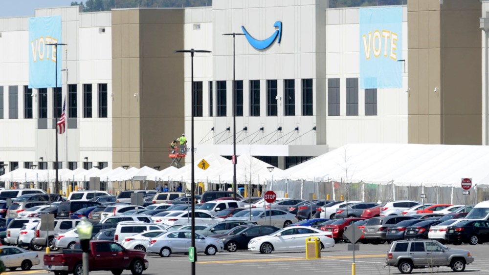 An Amazon warehouse that labor is trying to organize is shown in Bessemer, Ala., Tuesday, March 30, 2021. Union representatives are pushing for some 6,000 Amazon workers to join the Retail, Wholesale and Department Store Union on the promise it will lead to better working conditions, better pay and more respect. Amazon is pushing back, arguing that it already offers more than twice the minimum wage in Alabama and workers get such benefits as health care, vision and dental insurance without paying union dues. (AP Photo/Jay Reeves)
