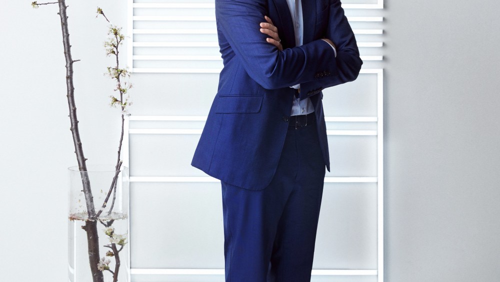 HSBC's Erwan Rambourg standing with tree