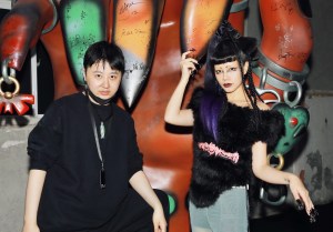 Designer Sensen Lii and the singer Jing after the show.