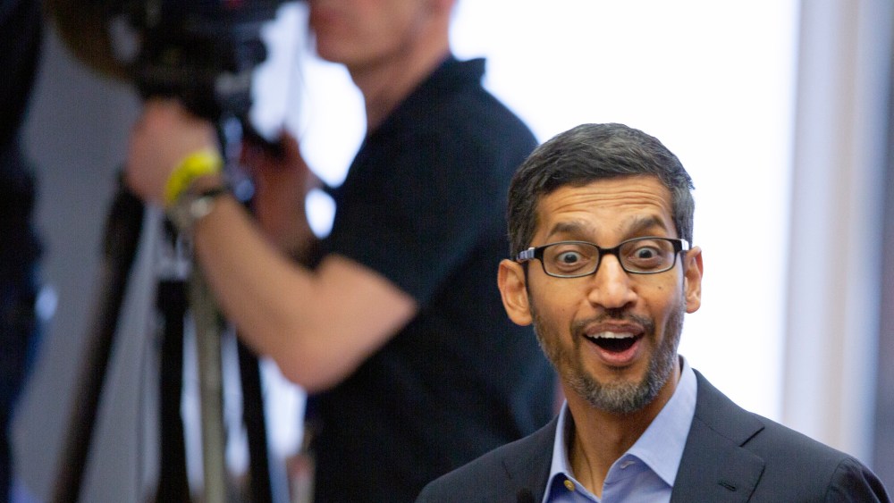 Google's chief executive Sundar Pichai arrives for an event on artificial intelligence at the Square in Brussels, Monday, Jan. 20, 2020. Google's chief executive called Monday for a balanced approach to regulating artificial intelligence, telling a European audience that the technology brings benefits but also negative consequences. (AP Photo/Virginia Mayo)