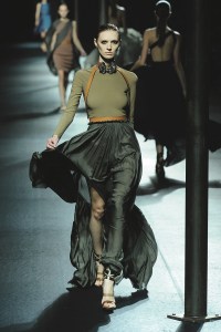 Long-sleeve green top wth with harness and flowing floor-length skirt in the Lanvin Spring/Summer 2011 show