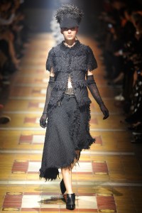 A model on the runway at the Lanvin fall 2014 show at École des Beaux-Arts.