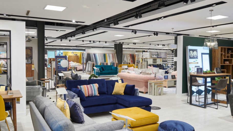 CEO Lord Simon Adam Wolfson explains what he means when he says the British fashion and home chain 'follows the money' in retail.