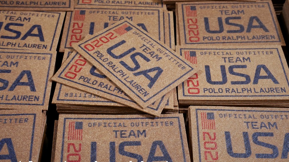 Ralph Lauren used Natural Fiber Welding's alternative leather for the back patch on its Team USA slim white denim pant.