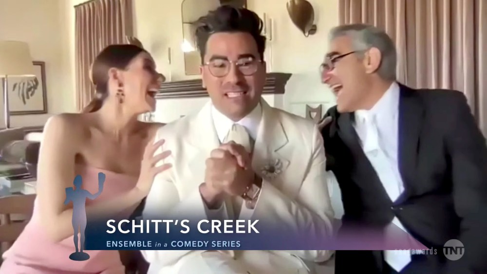 VARIOUS CITIES - APRIL 04: (L-R) In this screengrab released on April 4, 2021, Sarah Levy, Dan Levy, and Eugene Levy, winners of Outstanding Performance by an Ensemble in a Comedy Series for "Schitt's Creek", speak during the 27th Annual Screen Actors Guild Awards on April 04, 2021. (Photo by 27th Annual SAG Awards/Getty Images for WarnerMedia)