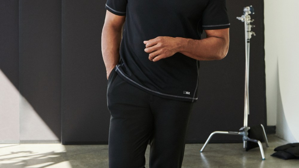 Michael Strahan expands Tailored Brands partnership to include his MSX line at Men's Wearhouse and Moores, with workleisure exclusives.