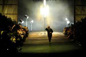 Designer Alber Elbaz on the runway after his Lanvin spring 2010 show at Halle Freyssinet.