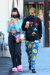 From Kylie Jenner to Sarah Jessica Parker, celebrities step out in a parade of loose-fitting jeans straight from the '90s.