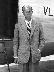 Lieut. Philip Mountbatten, R.N. (Prince Philip, The Duke Of Edinburgh) beside the Viking aircraft of the King's flight at London Airport in which he returned from Scotland after staying with the Royal family at Balmoral in 1947.
