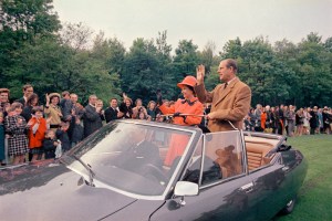 Queen Elizabeth II, with Prince Philip, in an open topped car as they leave an event, in Paris, on May 16, 1972.
