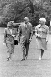 Queen Elizabeth II of England, Prince Philip, Duke of Edinburgh, and Barbara Bush attend a ceremony welcoming the queen to the White House in Washington, D.C., on May 14, 1991.