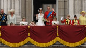 Britain's Prince William and his wife Kate, Duchess of Cambridge wave with Britain's Queen Elizabeth II, right, and Britain's Prince Charles with Camilla, Duchess of Cornwall  from the balcony of Buckingham Palace after the Royal Wedding in London Friday, April, 29, 2011. (AP Photo/Matt Dunham)