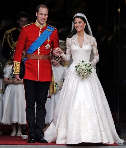 Britain's Prince William and his wife Kate, Duchess of Cambridge stand outside of Westminster Abbey after their Royal Wedding in London Friday, April, 29, 2011. (AP Photo/Martin Meissner)