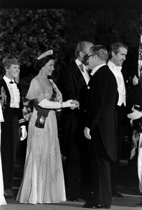 Queen Elizabeth II shakes hands with Nelson Rockefeller during a state dinner at the White House in Washington, D.C., on July 7, 1976.