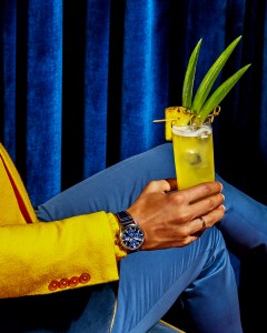 IWCÕs PilotÕs Chronograph 41 watch, mechanical, automatic movement caliber 69, in a stainless-steel case. Cartier Love 18-karat yellow gold bracelet. Ralph Lauren linen blazer and cashmere sweater. Herms Storm blue flamed cotton and linen canvas pants. The Jocker drink.