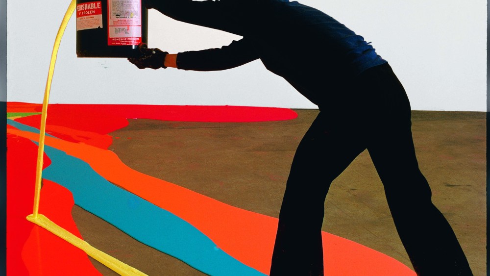 American artist Lynda Benglis works on a commissioned project for the University of Rhode Island, Kingston, Rhode Island, 1969. The work involves poured latex paint for an installation at the university. (Photo by Henry Groskinsky/The LIFE Picture Collection via Getty Images)