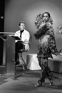 Halston and model Pat Cleveland in Halston Originals on stage during the international premiere of Halston's U.S Olympic teams collection on October 27, 1975, in Washington, D.C.