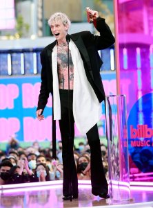 2021 BILLBOARD MUSIC AWARDS -- Pictured: Machine Gun Kelly accepts Top Rock Artist on stage at the 2021 Billboard Music Awards held at the Microsoft Theater on May 23, 2021 -- (Photo by: Emma McIntyre/NBC)