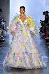 A model walks the runway in an evening gown from Prabal Gurung's Spring 2020 10th Anniversary fashion show.