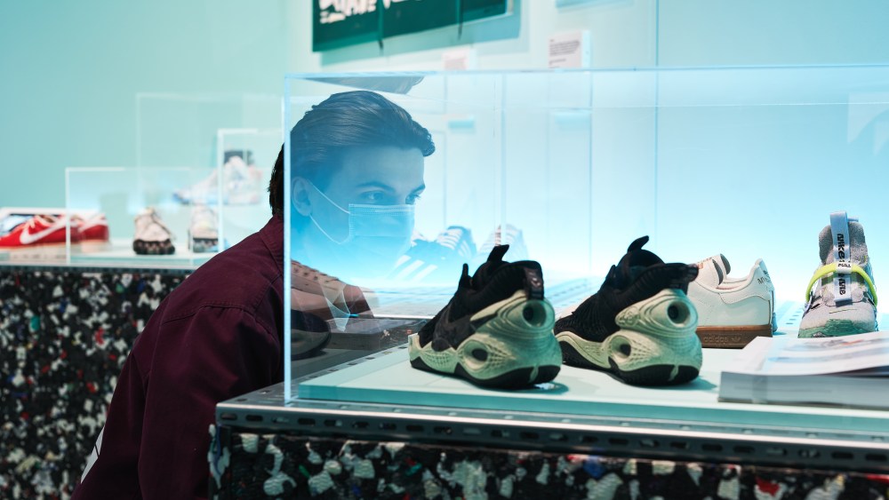 A visitor at Sneaker Unboxed Exhibition at London Design Museum