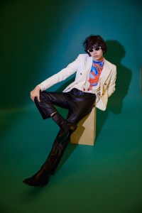 Nanushka’s organic cotton blazer, Nahmias’ silk shirt worn over ERL’s polyester mock neck and Taak’s leather pants. Celine sunglasses; Sunni Sunni boots.