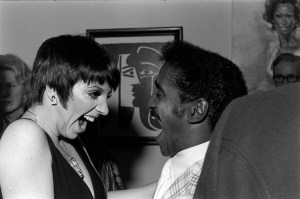 Liza Minnelli (L) and Sammy Davis Jr. attend a party in Los Angeles on January 27, 1975.